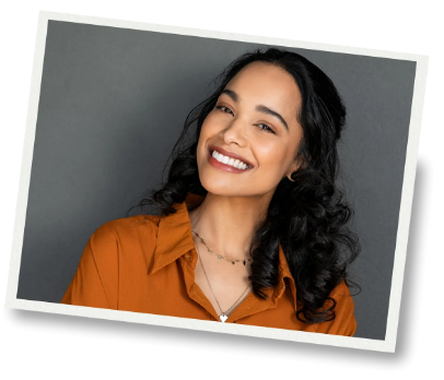 Smiling woman in orange collared shirt