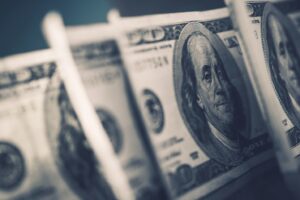 Several 100-dollar bills in a row.